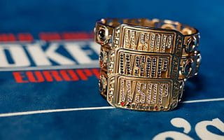 A WSOP Europe Bracelet on a Blue King's Resort Poker Table